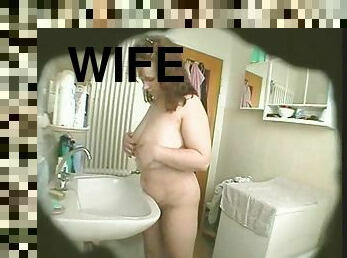 BBW Wife masturbates in bathroom on a hidden cam