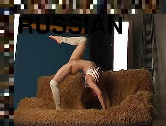 Hot redhead Russian babe strips down in the stables
