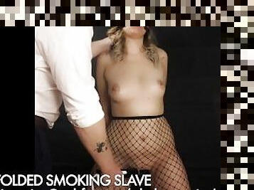 BLINDFOLDED SMOKING SLAVE