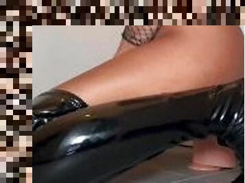 Turkish teen masturbates/rides in patent latex boots & fishnet lingerie giant dildo