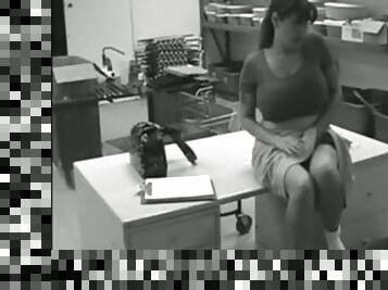 Huge-boobed amateur slut rubs her vag in an office in hidden cam clip