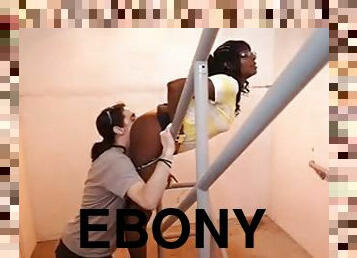 Ebony bitch wearing glasses gets her cunt licked on the stairs