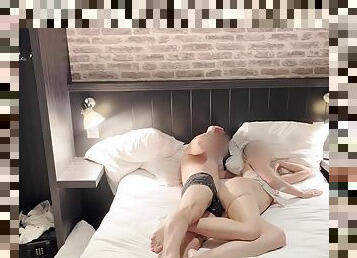 Mother-in-law and her son share a bed in a hotel