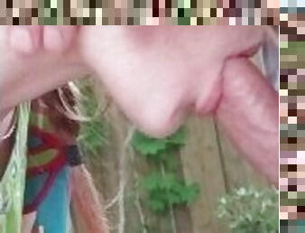 Amateur redhead gives quick summer outdoor patio blowjob