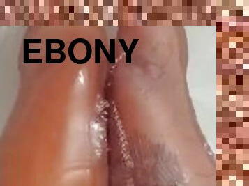 Cute ebony feet in bath