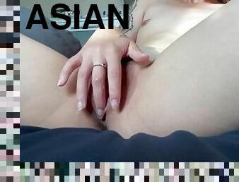 Horny Asian fingers her tight wet pussy