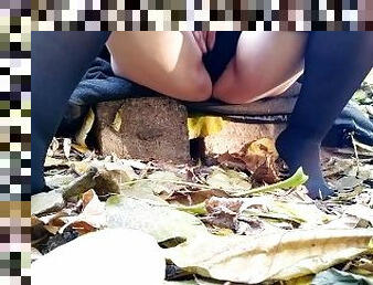 Peeing outdoors in pantyhose with bare feet