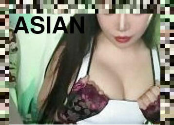Asian Tifa cosplayer plays with her natural big tits
