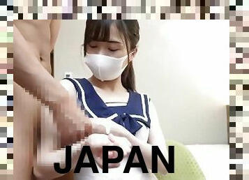 Japanese girl gives a guy an armpit job wearing sailor suits