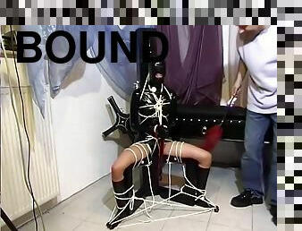Bound And In A Latex Suit - Absurdum Productions