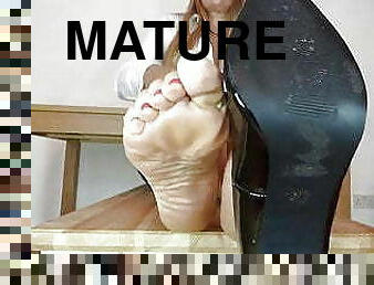 Wrinkled soles feet mature