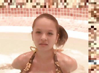 Teen Paris Milan in a hot tub bikini just to tease you