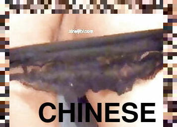 Chinese girl masturbates
