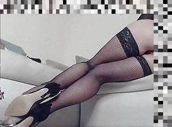 Fishnet stockings and high heels