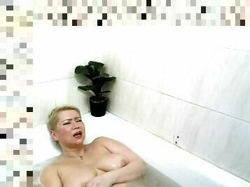 Busty mommy masturbates and cums in the shower ...