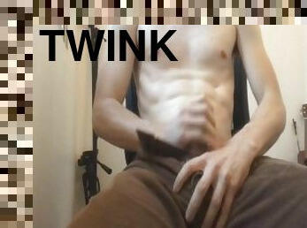 Twink punches his balls as hard as possible and cums using vibrating cock ring onto himself