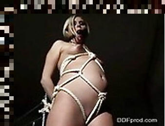Pregnant gal is tied up and gagged