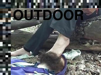 FootFetish outdoor. I serve as a coaster and a foot mat in the forest so that she does not get them