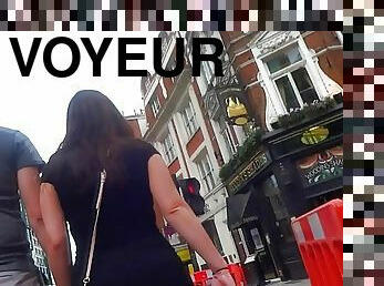 Spying on brunette damsel with juicy ass on the street