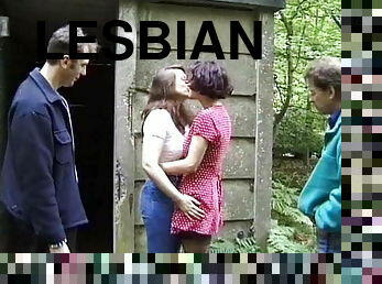 Two lesbians in front of voyeurs in the woods