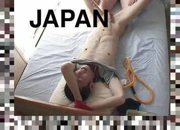 Tied up guy enjoys getting pleasured by his Japanese girlfriend