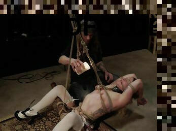 Blindfolded and tied up teen April Showers covered in hot wax