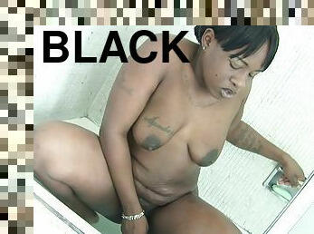 Black girl with floppy tits gets naked and fucks in the shower