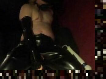 Dildo-gagged FtM Cowboy in Leather and Latex Amuses Himself