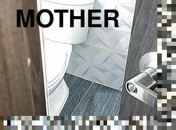 I record my stepmother while she masturbates in the bathroom