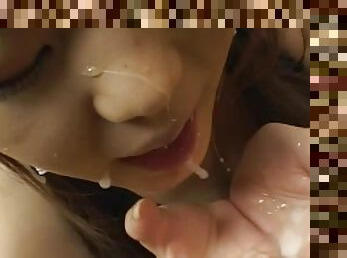 Japanese babe covered in jizz