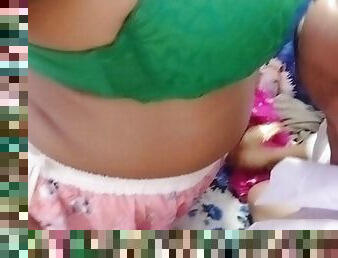 Desi girl opens her green bra and grabs boyfriend&#039;s cock.