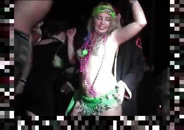 Topless hotties dance at Mardi Gras