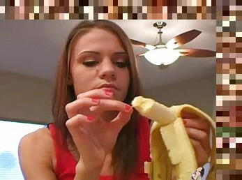 Addison eats a banana in a very naughty manner