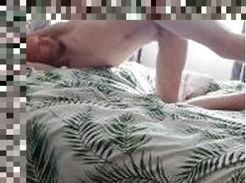 Very very skinny teen stretches himself on the bed showing off his ribs