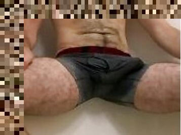 Twink pisses in his underwear in the hotel bath