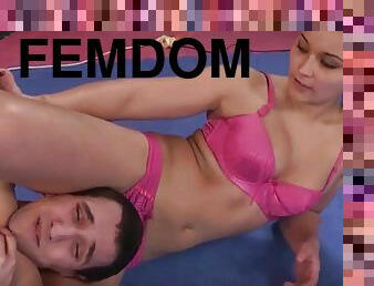 Sexy brunette wrestling on the mat by Femdom Austria