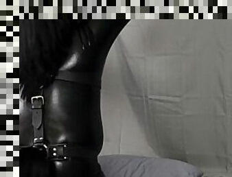 Pony Play - Latex pony takes his beating from a crop, whip, and flogger