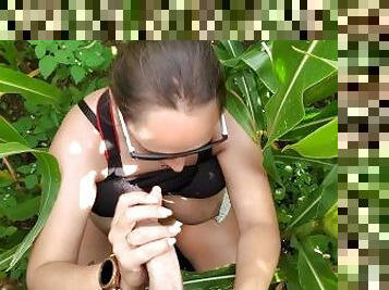 Risky outdoor blowjob from girl with natural tits.
