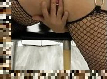 ButPlug in net stockings and high heels