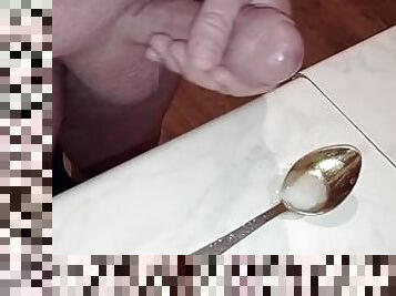 the wife excited her husband with a blowjob. the husband jerked off and finished in a spoon.