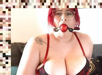 Busty Redhead MILF Rubs Her Pussy While Wearing a Ball Gag